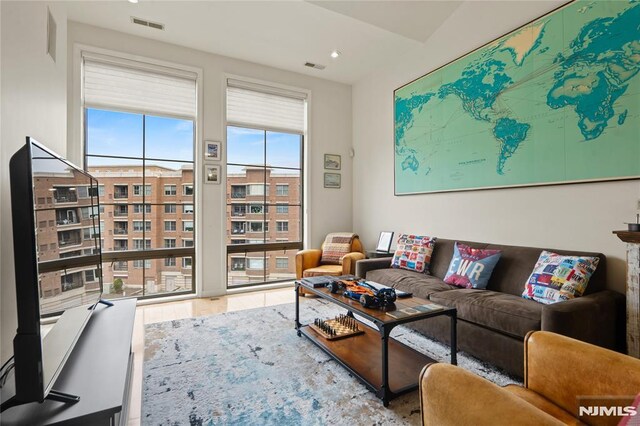 24 Ave At Port Imperial Unit 416, West New York, NJ 07093 - living area featuring wood finished floors and recessed lighting