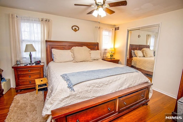 125 Virginia Ave, Dumont, NJ 07628 - bedroom with wood finished floors, a closet, baseboards, and a ceiling fan