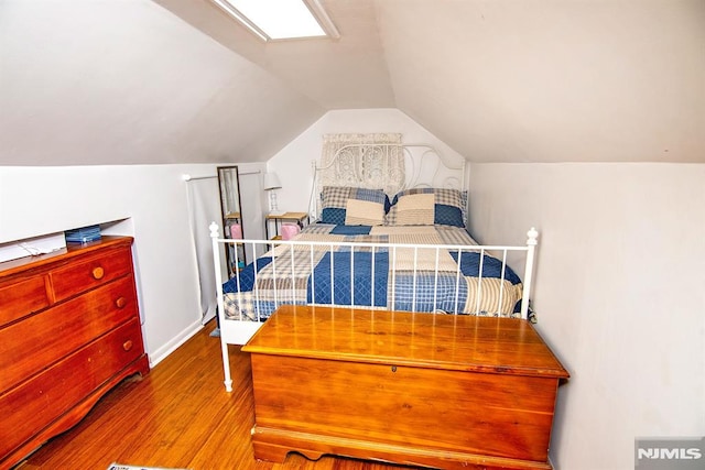 125 Virginia Ave, Dumont, NJ 07628 - bedroom with wood finished floors and vaulted ceiling