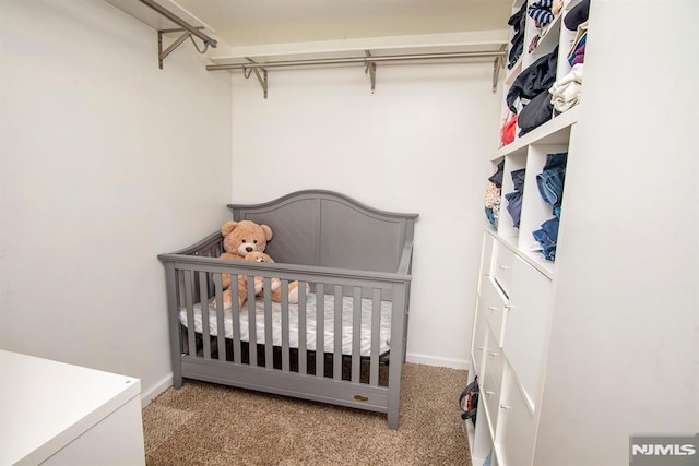 125 Virginia Ave, Dumont, NJ 07628 - carpeted bedroom featuring baseboards and a nursery area