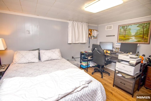 125 Virginia Ave, Dumont, NJ 07628 - bedroom featuring wood finished floors, ornamental molding, and an office area