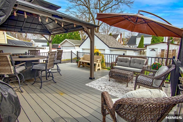 125 Virginia Ave, Dumont, NJ 07628 - wooden terrace featuring outdoor dining space, an outdoor hangout area, and a gazebo