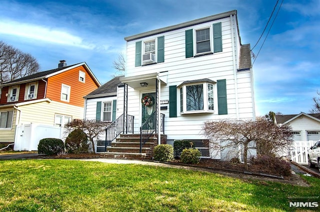 125 Virginia Ave, Dumont, NJ 07628 - traditional-style home featuring a front lawn