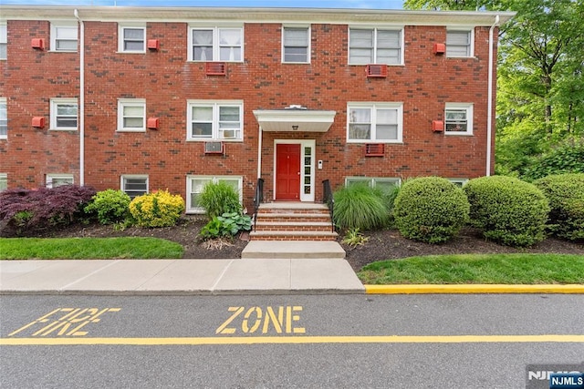 482 Joralemon St Unit G1, Belleville, NJ 07109 - view of front of property featuring brick siding and uncovered parking