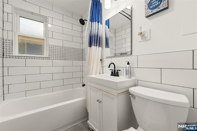 482 Joralemon St Unit G1, Belleville, NJ 07109 - full bath with toilet, vanity, shower / tub combo, tile walls, and backsplash