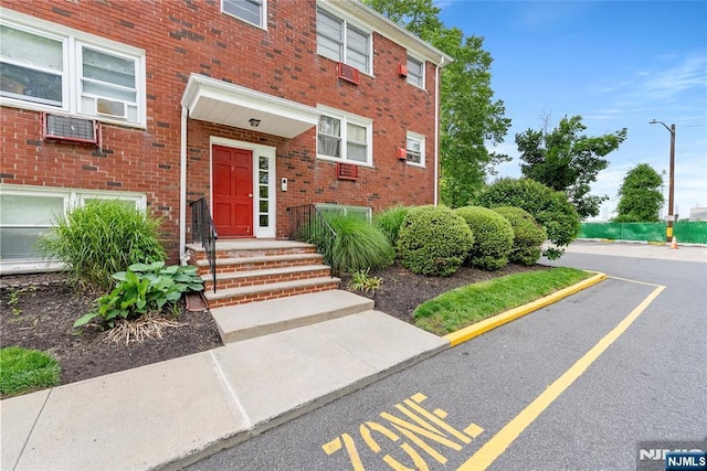 482 Joralemon St Unit G1, Belleville, NJ 07109 - property entrance with uncovered parking and brick siding