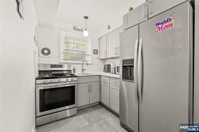 482 Joralemon St Unit G1, Belleville, NJ 07109 - kitchen featuring stainless steel appliances, gray cabinetry, a sink, light countertops, and light tile patterned floors