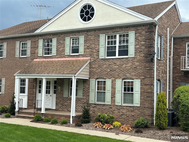 346 Maple Unit 3, Oradell, NJ 07649 - townhome / multi-family property with a porch, brick siding, and a shingled roof