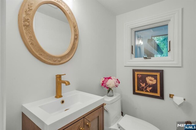 193 S Franklin Tpke, Ramsey, NJ 07446 - half bathroom featuring vanity and toilet