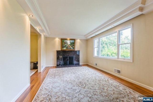 277 Jefferson Ave, Cresskill, NJ 07626 - unfurnished living room with ornamental molding, light wood-style floors, baseboards, and a fireplace