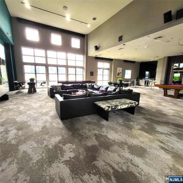 26 Ave At Port Imperial Unit 210, West New York, NJ 07093 - living area featuring carpet flooring, a high ceiling, and billiards table