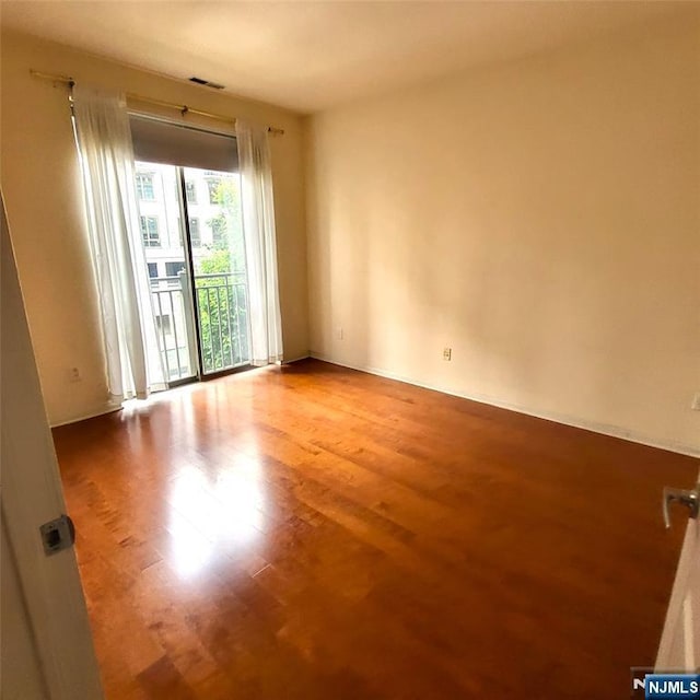 26 Ave At Port Imperial Unit 210, West New York, NJ 07093 - spare room with wood finished floors