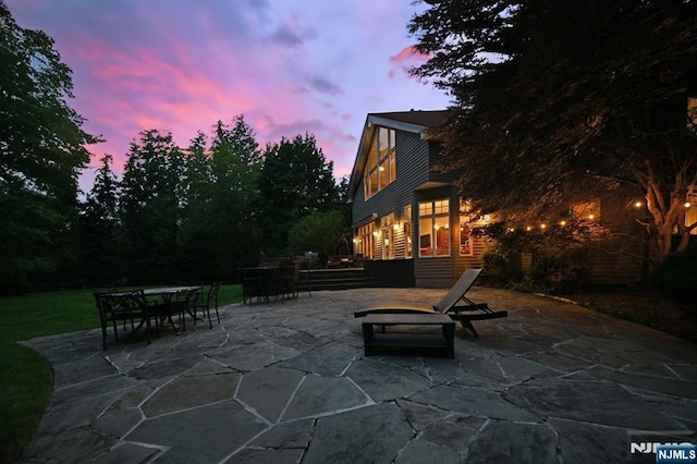 24 Old Chimney Rd, Upper Saddle River, NJ 07458 - patio terrace at dusk with outdoor dining space and a patio