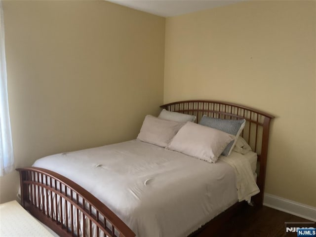 65 1st St, Allendale, NJ 07401 - bedroom with baseboards and wood finished floors