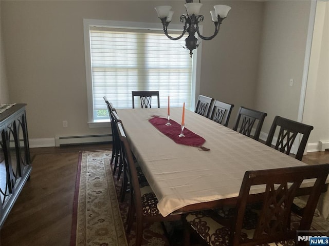 65 1st St, Allendale, NJ 07401 - dining room featuring a baseboard heating unit, a chandelier, baseboards, and dark wood-type flooring