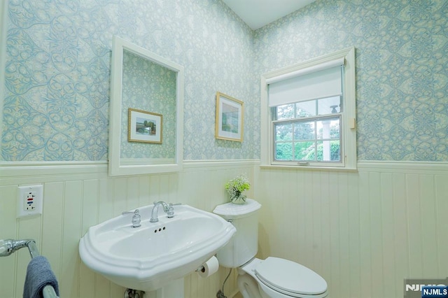 466 Park St, Montclair, NJ 07043 - bathroom with a sink, wallpapered walls, a wainscoted wall, and toilet