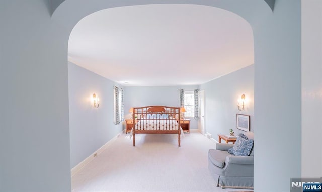 466 Park St, Montclair, NJ 07043 - bedroom with carpet flooring, arched walkways, and baseboards