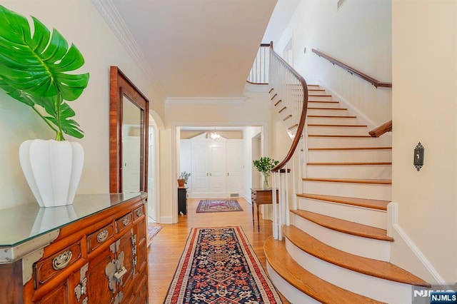 466 Park St, Montclair, NJ 07043 - stairs with crown molding and wood finished floors