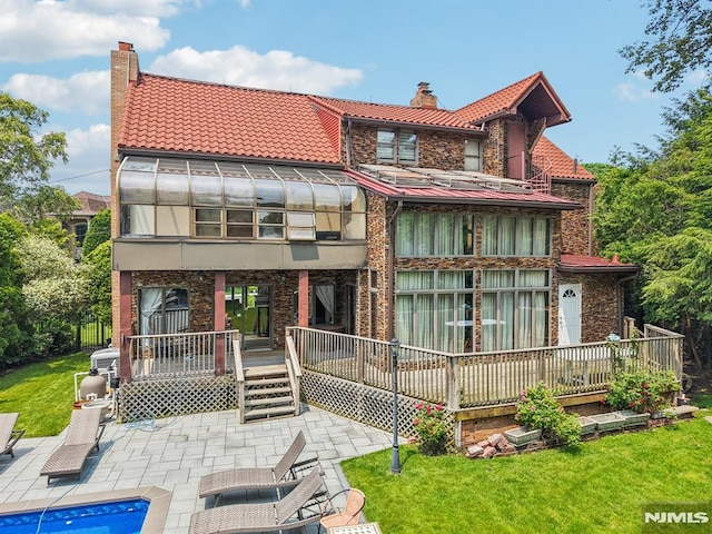 1060 Briar Way, Fort Lee, NJ 07024 - rear view of property with a tile roof, a chimney, and stone siding