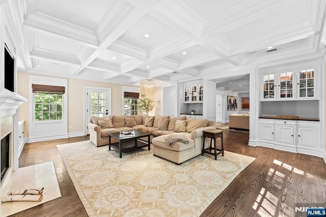 56 Knoll Rd, Tenafly, NJ 07670 - living area featuring wood finished floors, a high end fireplace, beam ceiling, baseboards, and coffered ceiling