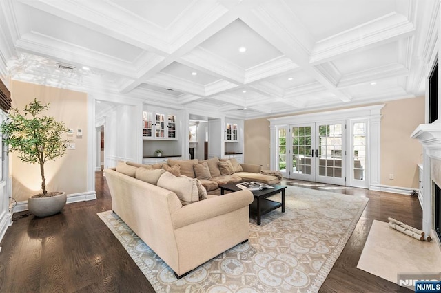 56 Knoll Rd, Tenafly, NJ 07670 - living room with a high end fireplace, wood finished floors, baseboards, beam ceiling, and recessed lighting