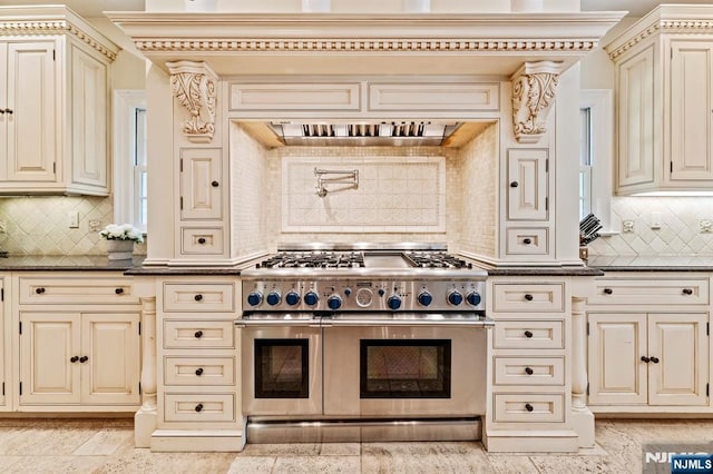56 Knoll Rd, Tenafly, NJ 07670 - kitchen featuring cream cabinetry, double oven range, backsplash, and plenty of natural light