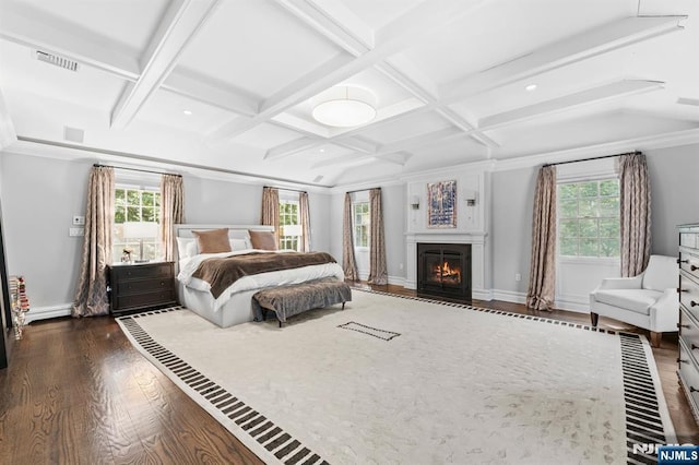 56 Knoll Rd, Tenafly, NJ 07670 - bedroom featuring wood finished floors, a fireplace with flush hearth, coffered ceiling, baseboard heating, and beam ceiling
