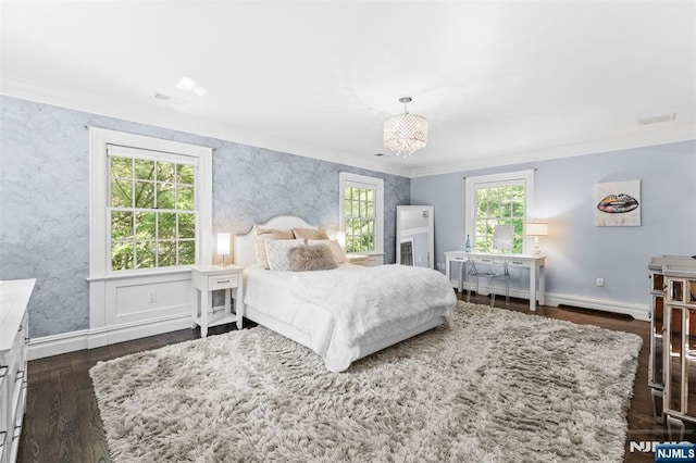 56 Knoll Rd, Tenafly, NJ 07670 - bedroom with crown molding, dark wood-type flooring, baseboards, and a chandelier