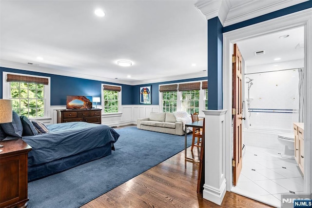 56 Knoll Rd, Tenafly, NJ 07670 - bedroom with crown molding, multiple windows, wainscoting, wood finished floors, and recessed lighting