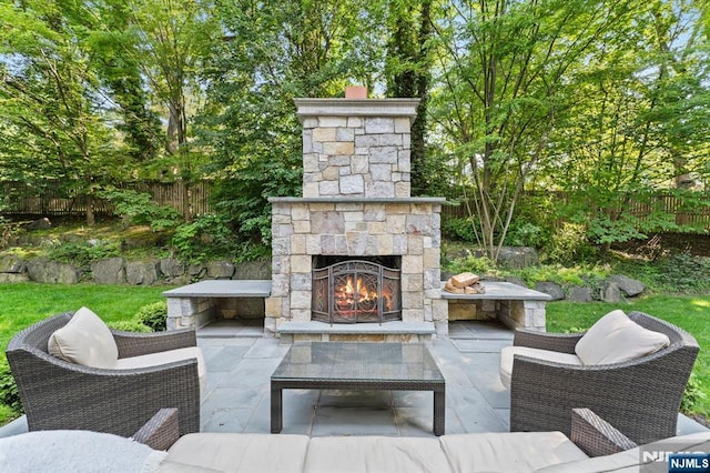56 Knoll Rd, Tenafly, NJ 07670 - fenced backyard with a patio and an outdoor living space with a fireplace