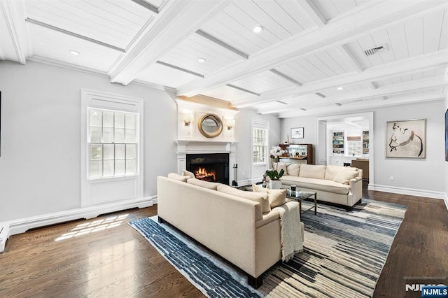 56 Knoll Rd, Tenafly, NJ 07670 - living area with a lit fireplace, wood finished floors, baseboards, recessed lighting, and beam ceiling