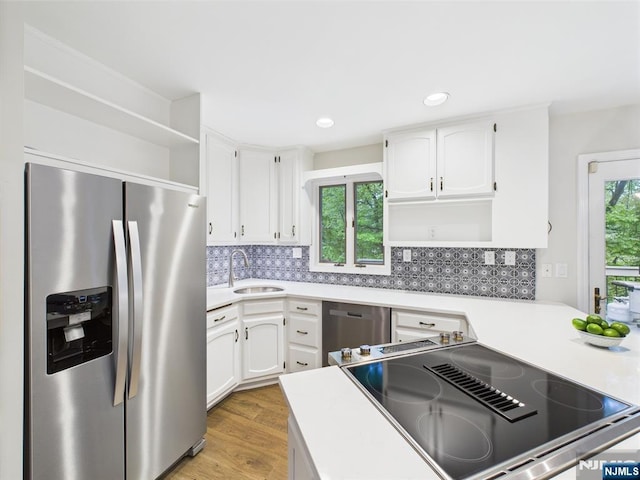 995 Andover Ter, Ridgewood, NJ 07450 - kitchen featuring appliances with stainless steel finishes, open shelves, a sink, white cabinets, and recessed lighting