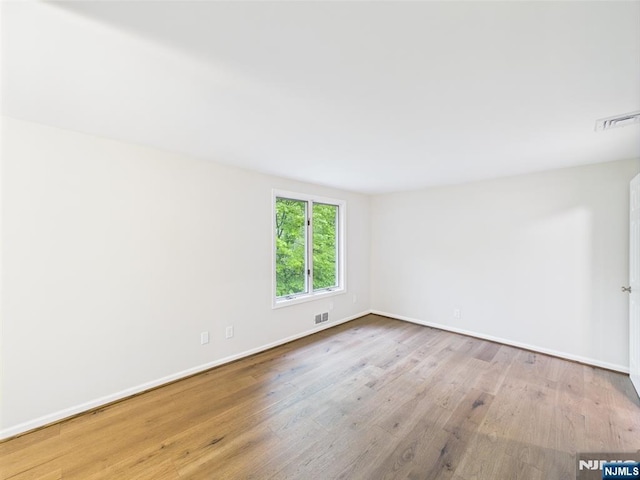 995 Andover Ter, Ridgewood, NJ 07450 - empty room featuring baseboards and wood finished floors