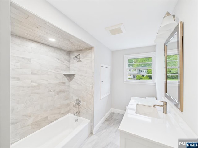 995 Andover Ter, Ridgewood, NJ 07450 - full bath featuring baseboards, double vanity, and shower / bathtub combination