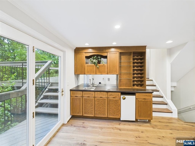 995 Andover Ter, Ridgewood, NJ 07450 - bar featuring stairway, light wood-type flooring, a sink, recessed lighting, and ornamental molding
