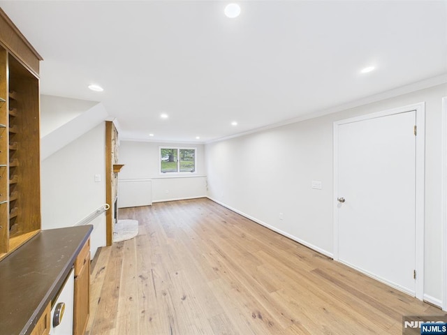 995 Andover Ter, Ridgewood, NJ 07450 - unfurnished living room featuring light wood finished floors, recessed lighting, and crown molding