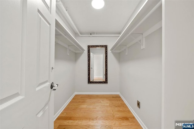 800 Palisade Ave Unit 1804, Fort Lee, NJ 07024 - walk in closet featuring light wood-style flooring