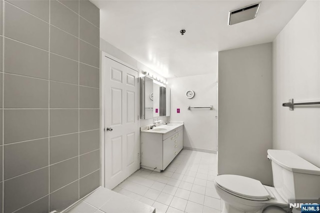 800 Palisade Ave Unit 1804, Fort Lee, NJ 07024 - bathroom with tile patterned flooring, vanity, and toilet