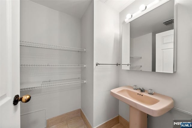800 Palisade Ave Unit 1804, Fort Lee, NJ 07024 - bathroom with baseboards