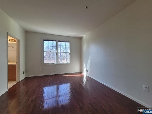 45 Birch St Unit 207, Ridgefield Park, NJ 07660 - empty room featuring dark wood-type flooring and baseboards