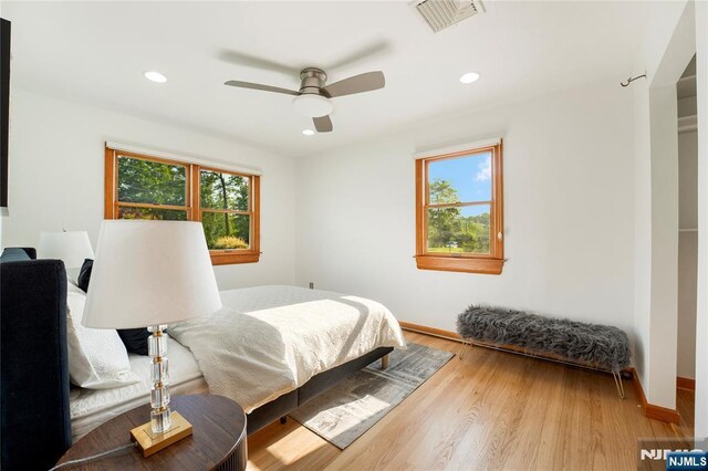 11 Hillcrest Blvd, Warren, NJ 07059 - bedroom with multiple windows, wood finished floors, baseboards, recessed lighting, and ceiling fan