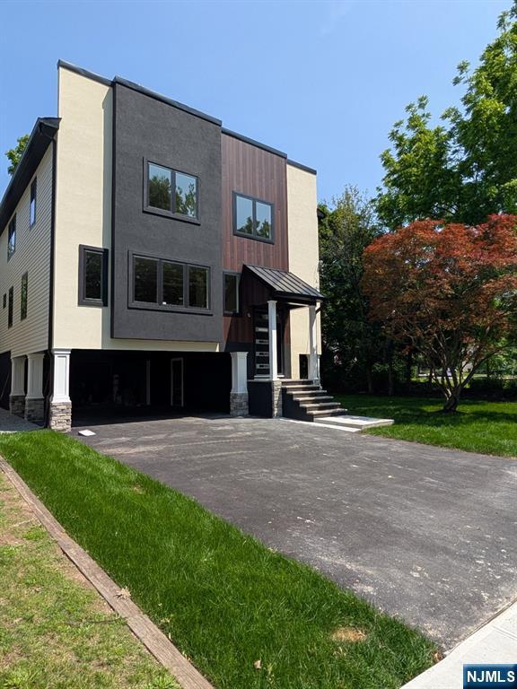 429 Riverside Ave, Rutherford, NJ 07070 - modern home with stone siding