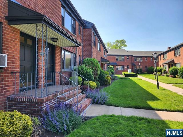 2163B N Central Rd Unit B, Fort Lee, NJ 07024 - view of community featuring a lawn