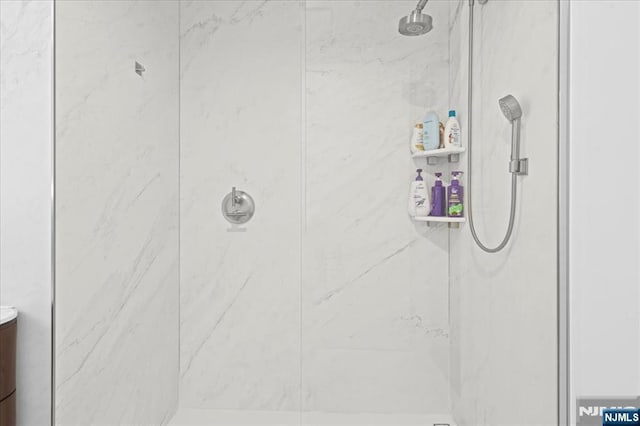 320 Adolphus Ave Unit 317, Cliffside Park, NJ 07010 - bathroom view of a marble finish shower and vanity