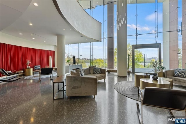 320 Adolphus Ave Unit 317, Cliffside Park, NJ 07010 - building lobby featuring a high ceiling, a wall of windows, and recessed lighting