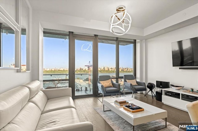 320 Adolphus Ave Unit 317, Cliffside Park, NJ 07010 - living area featuring plenty of natural light, wood finished floors, and a chandelier