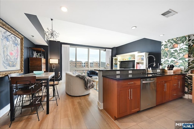 800 Jackson St Unit 505, Hoboken, NJ 07030 - kitchen featuring stainless steel dishwasher, open floor plan, a sink, light wood-type flooring, and brown cabinetry