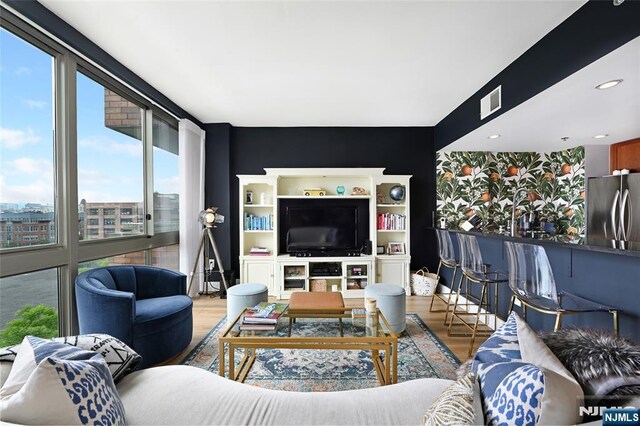 800 Jackson St Unit 505, Hoboken, NJ 07030 - living room with wood finished floors and expansive windows