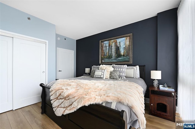 800 Jackson St Unit 505, Hoboken, NJ 07030 - bedroom with wood finished floors and a closet