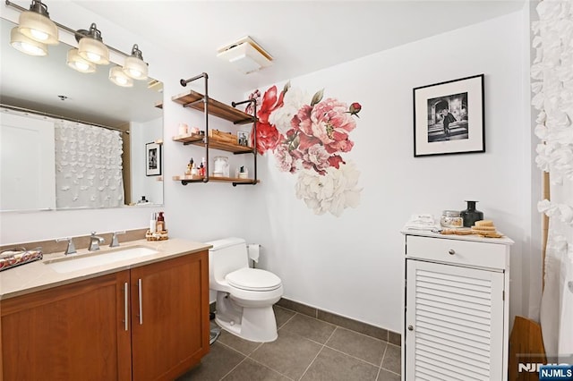 800 Jackson St Unit 505, Hoboken, NJ 07030 - bathroom featuring vanity, tile patterned flooring, toilet, and baseboards